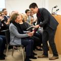 Foundation Scholar Tobias Tan presents 'Thank You' book to Mrs Mica Ertegun