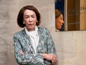 mica ertegun with ertegun house brass plaque